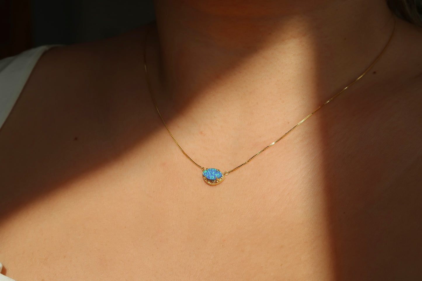 Tiny eye-shape opal necklace